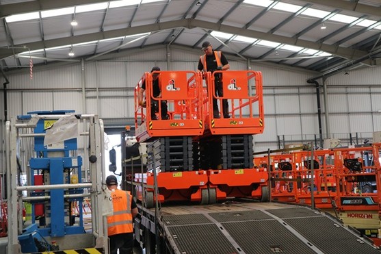Horizon Platforms MEWP driver/demonstrators unloading access platforms from a truck
