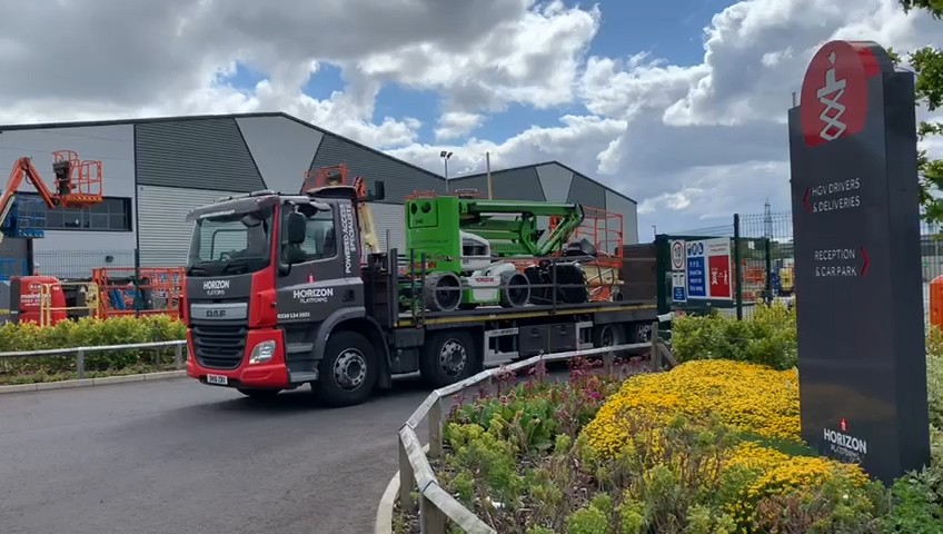 niftylift cherry picker on the back of a Horizon Platforms delivery truck  